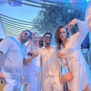Cyril with friends at a party