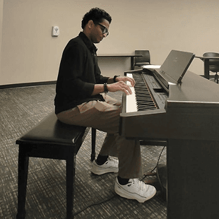 Cyril playing piano